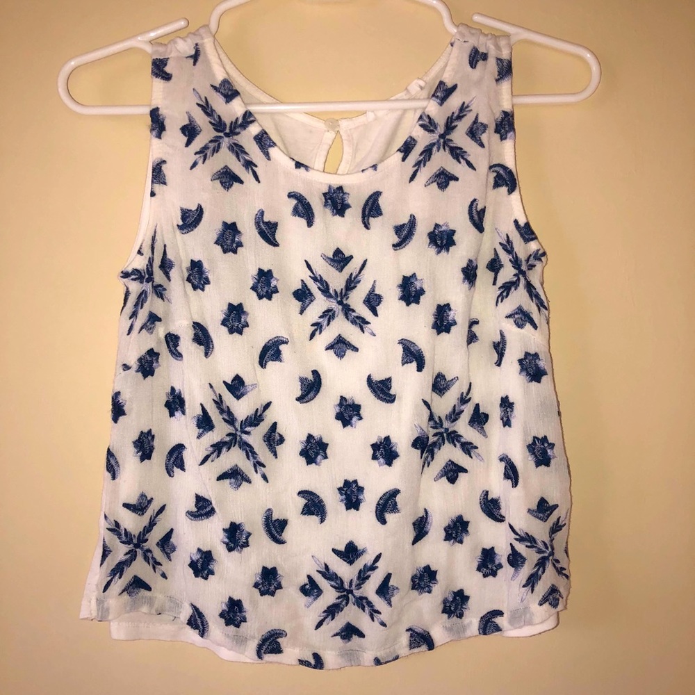 A shirt that is embroidered with flowers